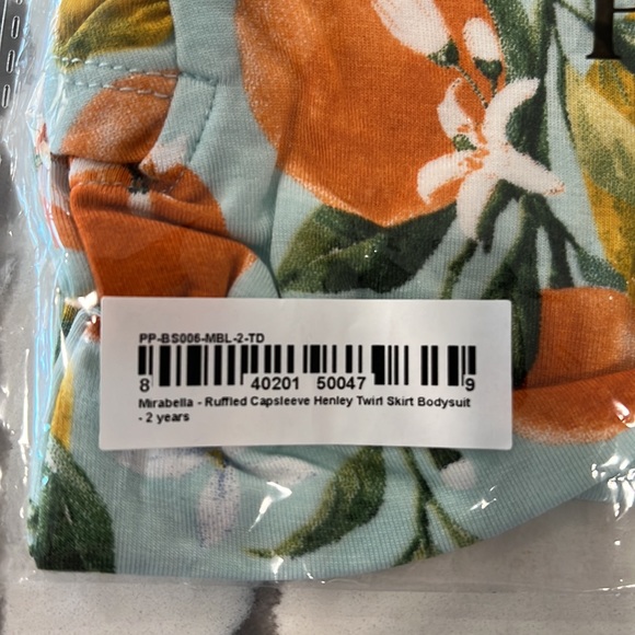 Posh Peanut Mirabella Ruffled Capsleeve Henley Twirl Bodysuit - Picture 2 of 5